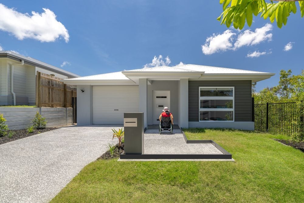 Home with wheelchair out front Home with wheelchair out front