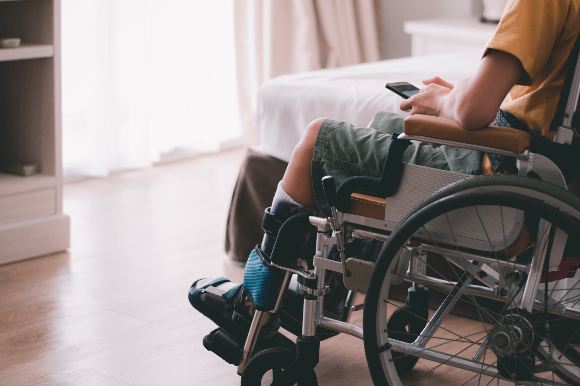 Wheelchair in home_shutterstock_1931627111